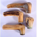 FOUR 19TH CENTURY ANTLER HORN WALKING CANE HANDLES. Largest 9 cm wide. (4)