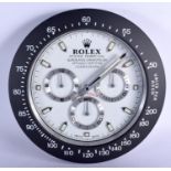 A ROLEX SHOP DISPLAY ADVERTISING WALL CLOCK. 33 cm diameter.