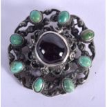 A VINTAGE SILVER RUBY GLASS AND TURQUOISE BROOCH. 19 grams. 3.5 cm wide.