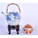 TWO EARLY 20TH CENTURY JAPANESE MEIJI PERIOD TEAPOTS AND COVERS together with a stand. Largest 20 cm