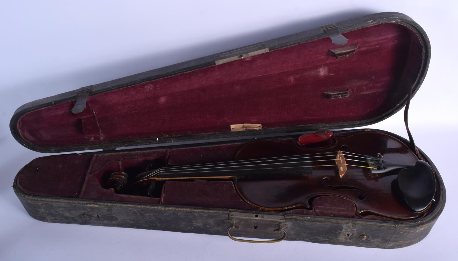 AN ANTIQUE GERMAN TWO PIECE BACK VIOLIN with scrolling terminal. 58 cm long.