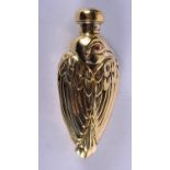 A SCENT BOTTLE IN THE FORM OF A BIRD WITH GEM SET EYES. 7.7cm x 3.3cm, weight 62.9g