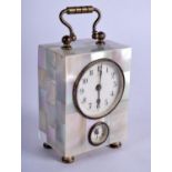 AN ANTIQUE FRENCH MOTHER OF PEARL MINIATURE CARRIAGE CLOCK. 8.5 cm high inc handle.