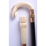 A VICTORIAN GOLD OVERLAID IVORY WALKING CANE together with a carved bone handled cane. Largest 84 cm