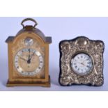 A CARR OF LONDON SILVER ROCOCO CLOCK and a Swiza brass clock. Largest 10 cm x 6 cm. (2)