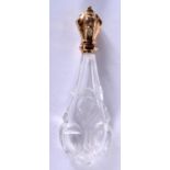 A GOLD TOPPED SCENT BOTTLE. 8.7cm x 2.5cm, weight 44.2g