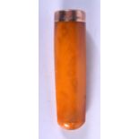 A 9CT GOLD AMBER CHEROOT HOLDER. 11 grams. 6.75 cm x 2 cm.