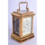 A CONTEMPORARY BRASS CARRIAGE CLOCK. 9.5 cm high inc handle.