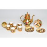 A COALPORT CHINA COFFEE SERVICE, modern, painted in polychrome enamels by Joseph Mottram with