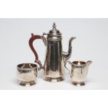 A SILVER THREE PIECE COFFEE SET, maker C.S. Green & Co. Ltd., Birmingham 1978, comprising tapering