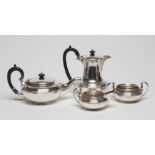 A SILVER FOUR PIECE TEA AND COFFEE SERVICE, maker Blackmore & Fletcher Ltd., London 1923, of squat