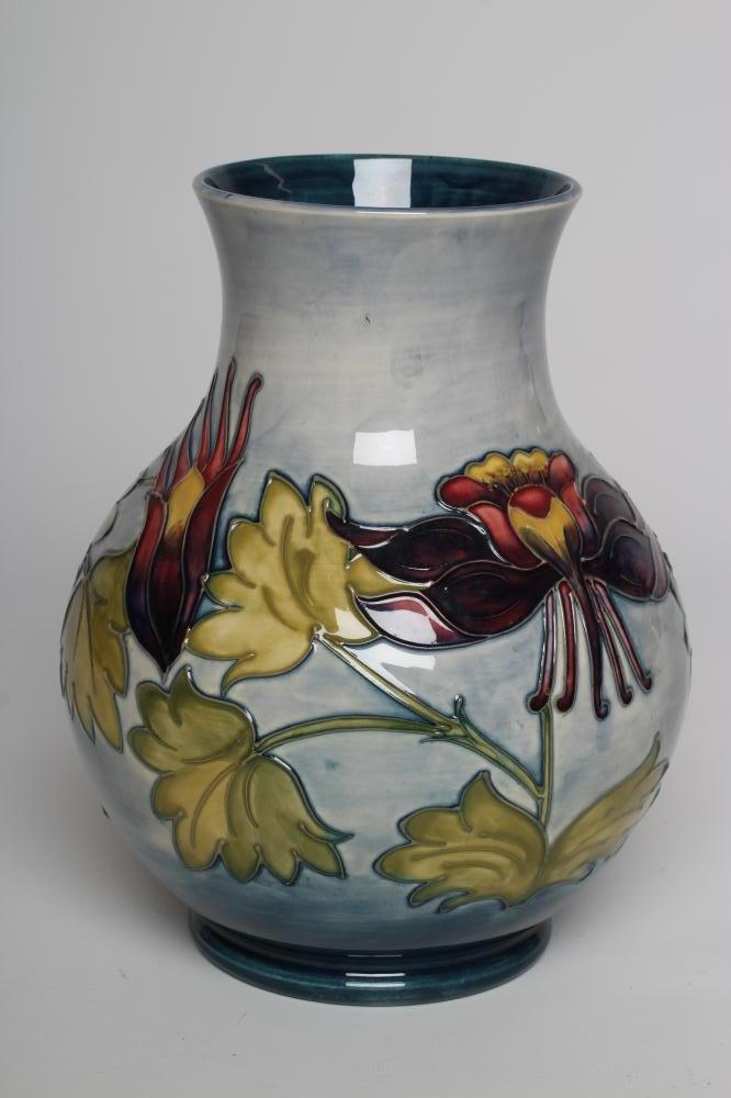 A MOORCROFT COLUMBINE VASE, mid 20th century, of baluster form, initialled WM in green, 9 1/2"