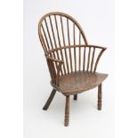 A WINDSOR SPINDLE BACK ARMCHAIR in ash and elm, possibly West Country, early 19th century, hoop