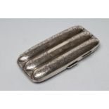 A SILVER TRIPLE CIGAR CASE, maker J. Gloster & Co., Birmingham 1918, of typical form with bright cut