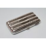 A LATE VICTORIAN SILVER QUADRUPLE CIGAR CASE, maker Hilliard & Thomason, Birmingham 1897, of typical