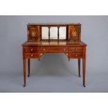 A LATE VICTORIAN SHERATON REVIVAL ROSEWOOD AND MARQUETRY WRITING TABLE, the raised back with pierced