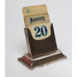 A SILVER PERPETUAL CALENDAR, maker's mark rubbed, Sheffield 1918, of plain oblong form with