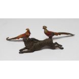 A BERGMAN STYLE BRONZE RUNNING HARE, bears urn mark to inner back leg, 4 1/2" long, together with