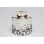 A SILVER TEA CANISTER, maker's mark rubbed, Chester 1935, of oval section, chased and engraved in