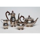 A SILVER FOUR PIECE TEA SERVICE maker Cooper Bros. & Sons, Sheffield 1968, of baluster form