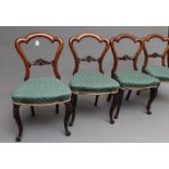 A SET OF SIX EARLY VICTORIAN ROSEWOOD DINING CHAIRS, of open spoon back form with arched top rail,