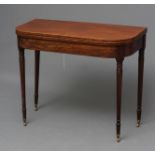 A GEORGIAN MAHOGANY FOLDING TEA TABLE, c.1800, of rounded oblong form with rosewood banding and