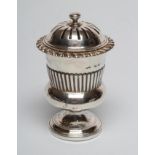 A GEORGE IV SILVER POUNCE POT, maker probably William Bell, London 1825, of semi fluted urn form