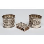 A PAIR OF LATE VICTORIAN SILVER NAPKIN RINGS, maker's mark C.H., Birmingham 1901, of oval form