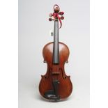 A GERMAN VIOLIN, one piece back, notched sound holes, rosewood turners, bears "Stradivarius"