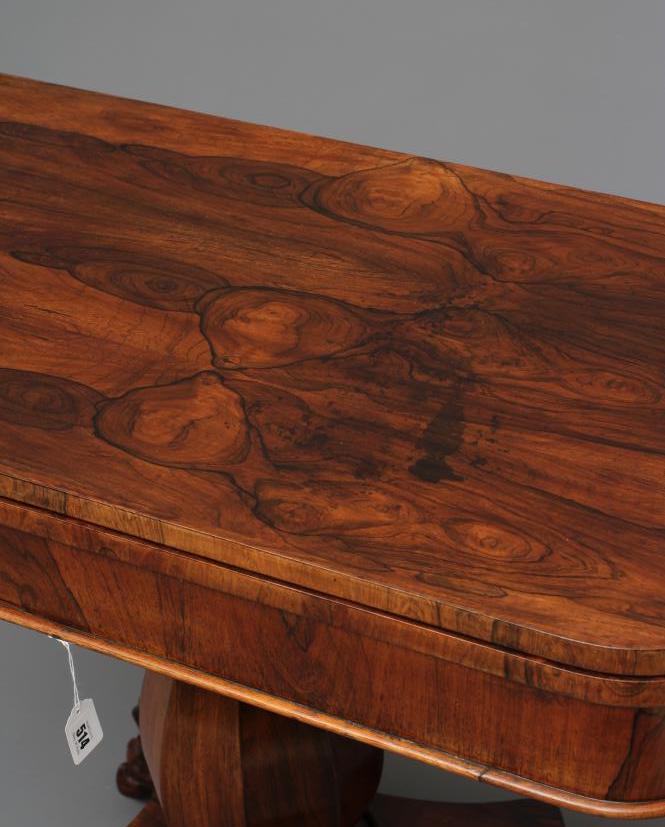 A VICTORIAN ROSEWOOD FOLDING TEA TABLE of rounded oblong form with swivel top, faceted baluster stem - Image 2 of 4