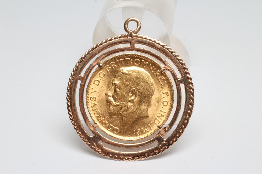 A GEORGE V SOVEREIGN, 1913, in a loose pendant mount stamped 9ct, 11g gross (Est. plus 17.5%