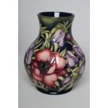 A MOORCROFT ANEMONE VASE of baluster form, initialled WM in blue, 9 1/2" high (Est. plus 21% premium