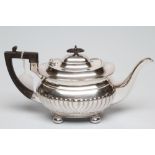 AN EDWARDIAN SILVER TEAPOT, maker's mark CB & S, Sheffield 1906, of semi fluted oblong baluster form