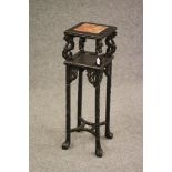 A CHINESE PADOUK WOOD JARDINIERE STAND, c.1900, of square form carved with bamboo inset red marble