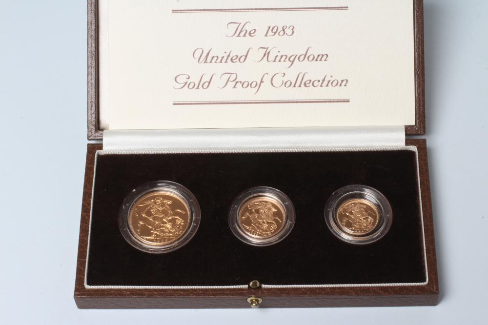 AN ELIZABETH II GOLD PROOF THREE COIN COLLECTION, 1983, comprising 2, sovereign and half