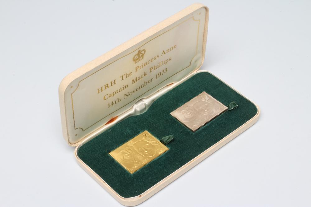 A 22CT GOLD AND SILVER REPLICA STAMP SET to commemorate the wedding of HRH Princess Anne ... 1973,