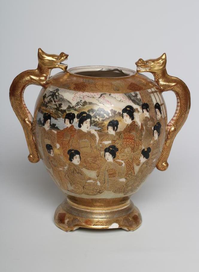 A SATSUMA EARTHENWARE VASE of rounded flared form with two dragon handles and raised upon a fixed " - Image 2 of 6