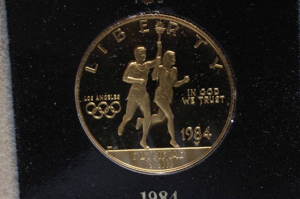 A 1984 OLYMPIC PROOF GOLD $10, shrink wrapped onto certificate, number 0015402, cased and boxed ( - Image 2 of 2