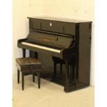 A BLUTHNER UPRIGHT PIANO. c.1925, No.110057, with eighty five keys, in ebonised case, 58" x 26 1/