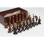 A GERMAN SELENUS CHESS SET, mid 19th century, with spindle turned natural and stained black
