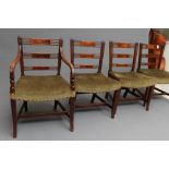A SET OF SEVEN REGENCY MAHOGANY DINING CHAIRS including an elbow chair, the square section