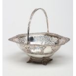 A SILVER BASKET, maker Wakely & Wheeler, London 1914, of deep oval form, the everted cast and