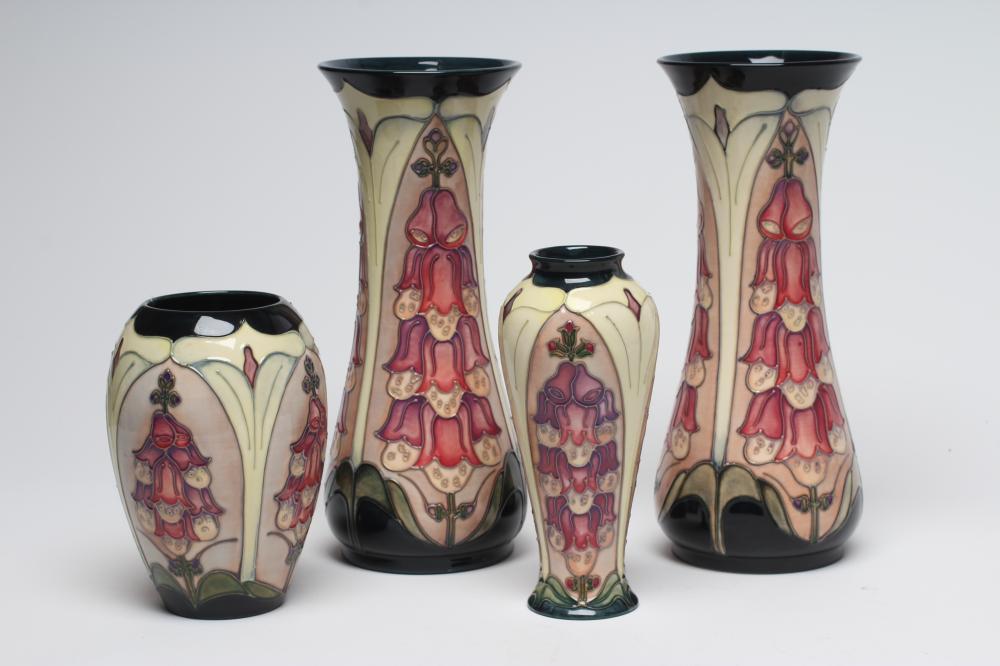 FOUR MOORCROFT FOXGLOVE VASES designed by Rachel Bishop, comprising a tall pair of waisted