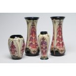 FOUR MOORCROFT FOXGLOVE VASES designed by Rachel Bishop, comprising a tall pair of waisted