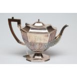 A LATE VICTORIAN SILVER PEDESTAL TEAPOT, maker's mark indistinct, Sheffield 1895, of semi fluted