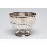 A LATE VICTORIAN SILVER ROSE BOWL, maker Huttons, London 1896, of semi fluted circular form engraved