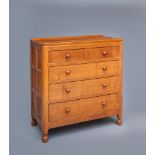A ROBERT THOMPSON ADZED OAK CHEST, 1950's, the moulded edged top with ledge back, two short over