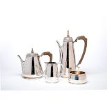 A FOUR PIECE SILVER TEA SERVICE, maker David Lawrence, Birmingham 1963 (hot water), 1964 (sugar