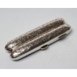 A LATE VICTORIAN SILVER DOUBLE CIGAR CASE, maker's mark TH, Birmingham 1895, of torpedo form, all