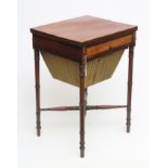 A REGENCY MAHOGANY SEWING TABLE, early 19th century, of oblong form with ebony stringing, split